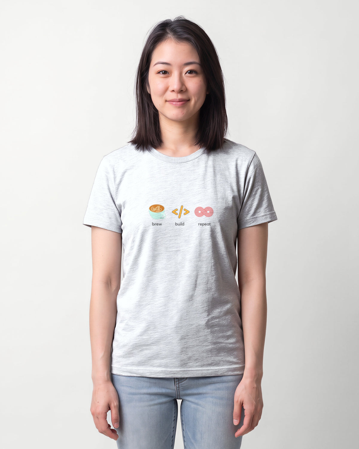 Brew Build Repeat in Ash on Bella+Canvas 3001, worn by Sophie. AI-generated model.