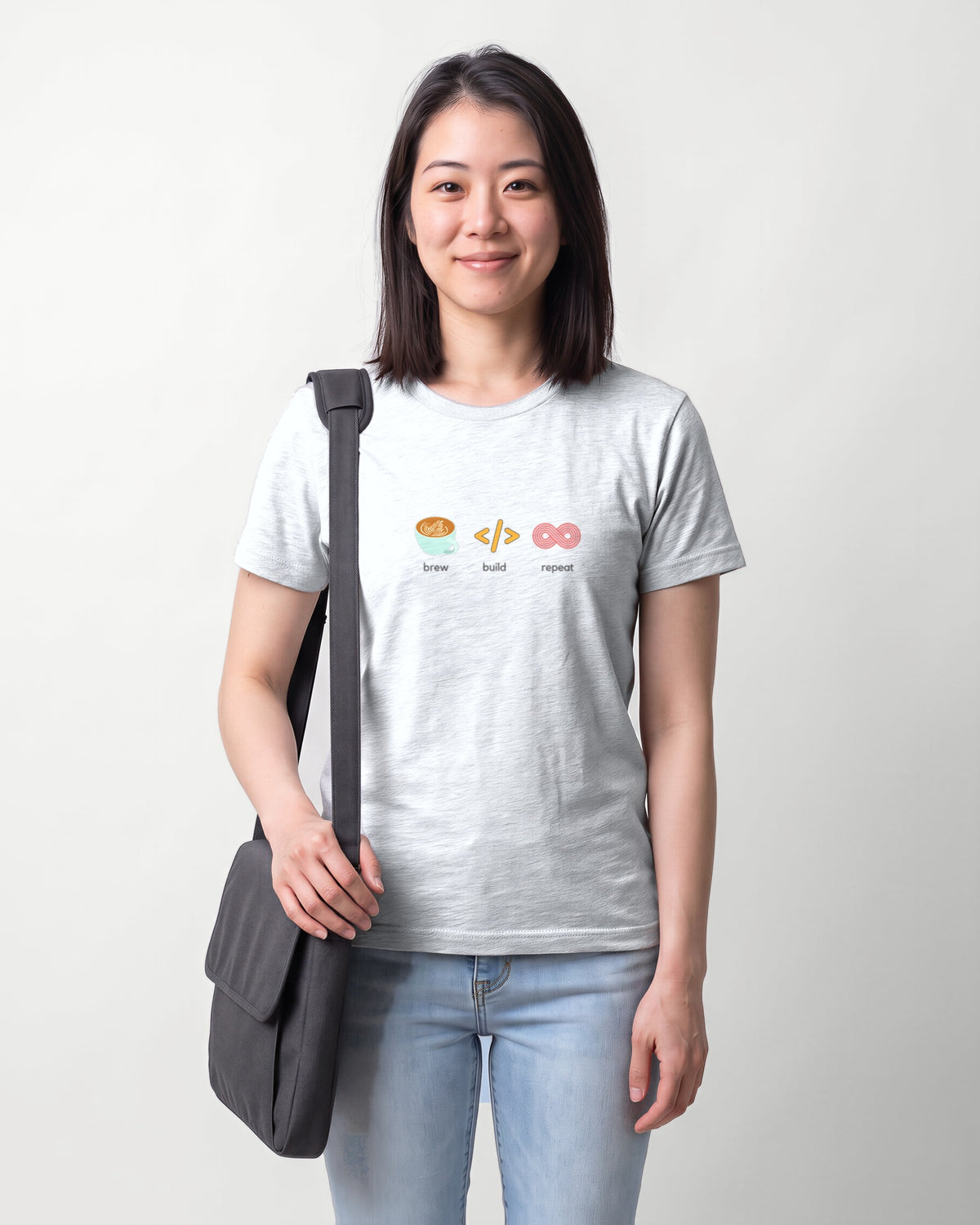 Brew Build Repeat in Ash on Bella+Canvas 3001, worn by Sophie. AI-generated model.