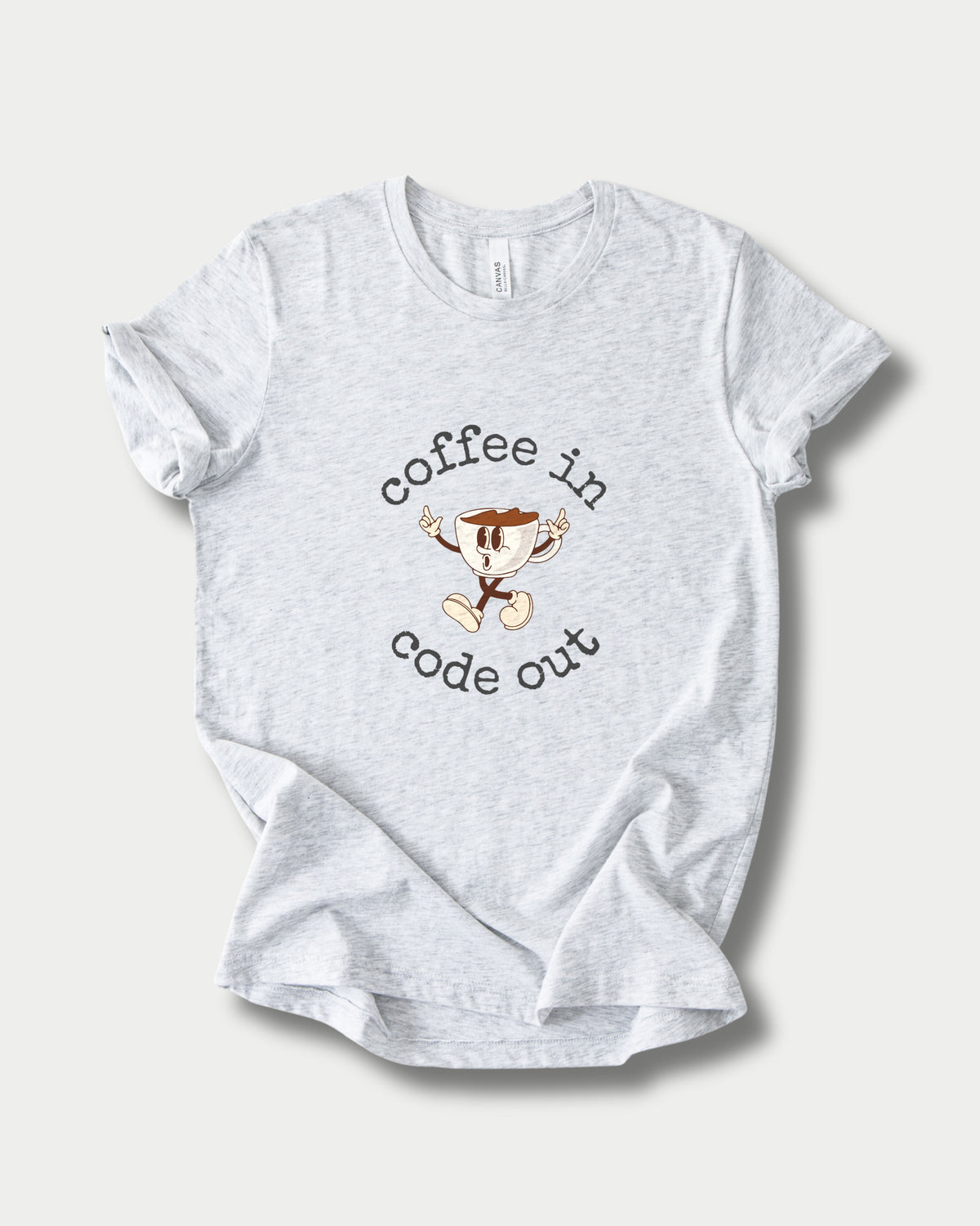 Coffee In Code Out in Ash on Bella+Canvas 3001, laid flat.