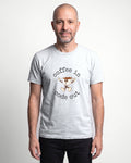 Coffee In Code Out in Ash on Bella+Canvas 3001, worn by Oliver. AI-generated model.