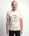 Coffee In Code Out in Natural on Bella+Canvas 3001, worn by Oliver. AI-generated model.