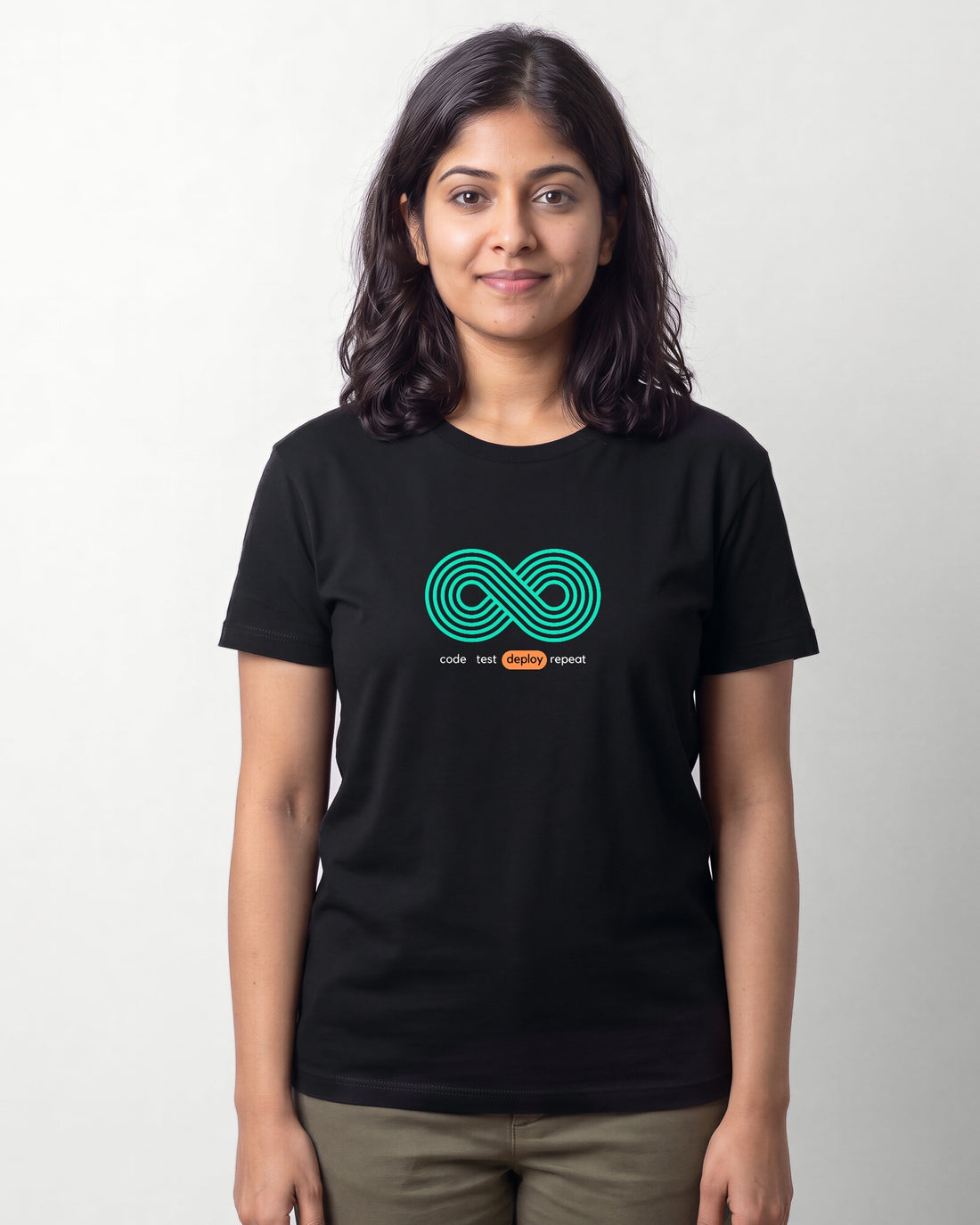 DevOps Infinity Loop in Black on Bella+Canvas 3001, worn by Maya. AI-generated model.