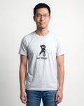 IaC Ninja in Ash on Bella+Canvas 3001, worn by Kenji. AI-generated model.