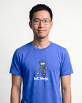 IaC Ninja in Heather True Royal on Bella+Canvas 3001, worn by Kenji. AI-generated model.