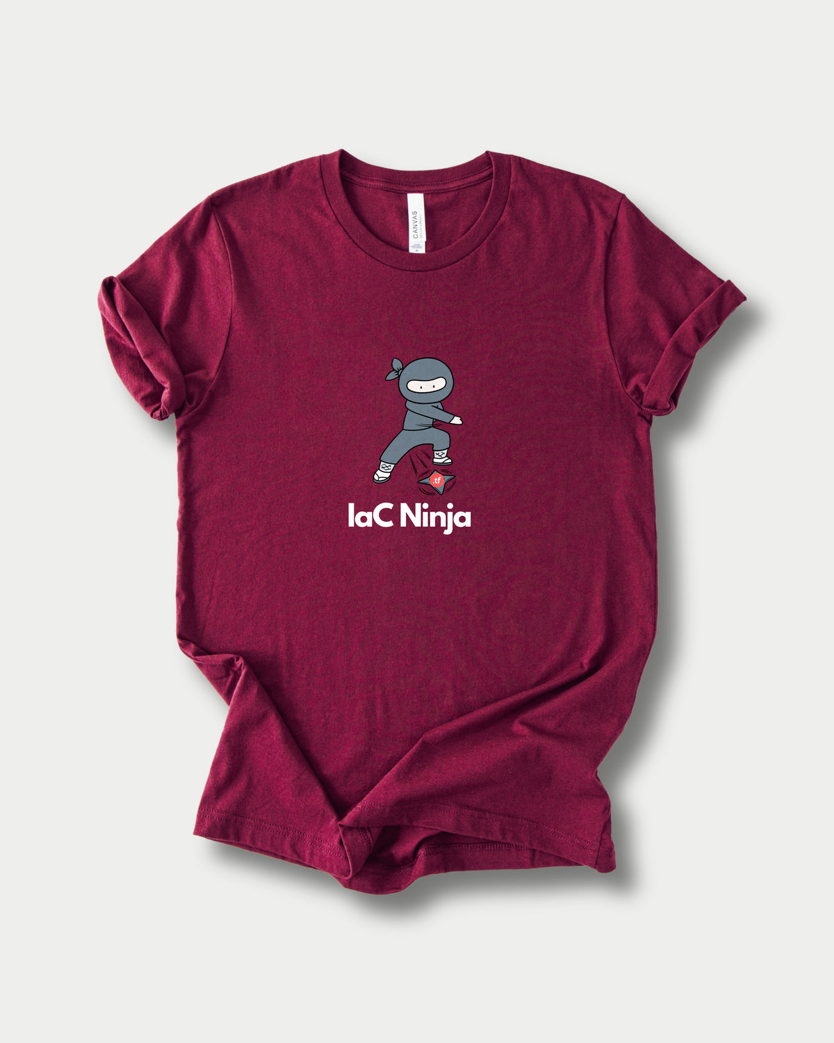 IaC Ninja in Maroon on Bella+Canvas 3001, laid flat.