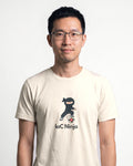 IaC Ninja in Natural on Bella+Canvas 3001, worn by Kenji. AI-generated model.