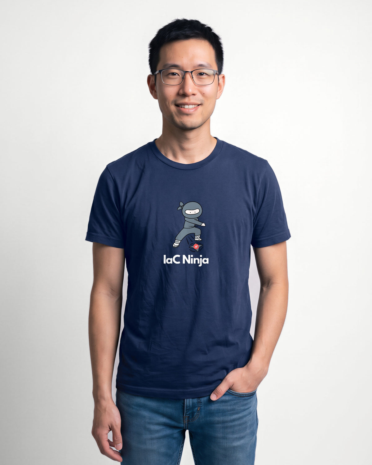 IaC Ninja in Navy on Bella+Canvas 3001, worn by Kenji. AI-generated model.