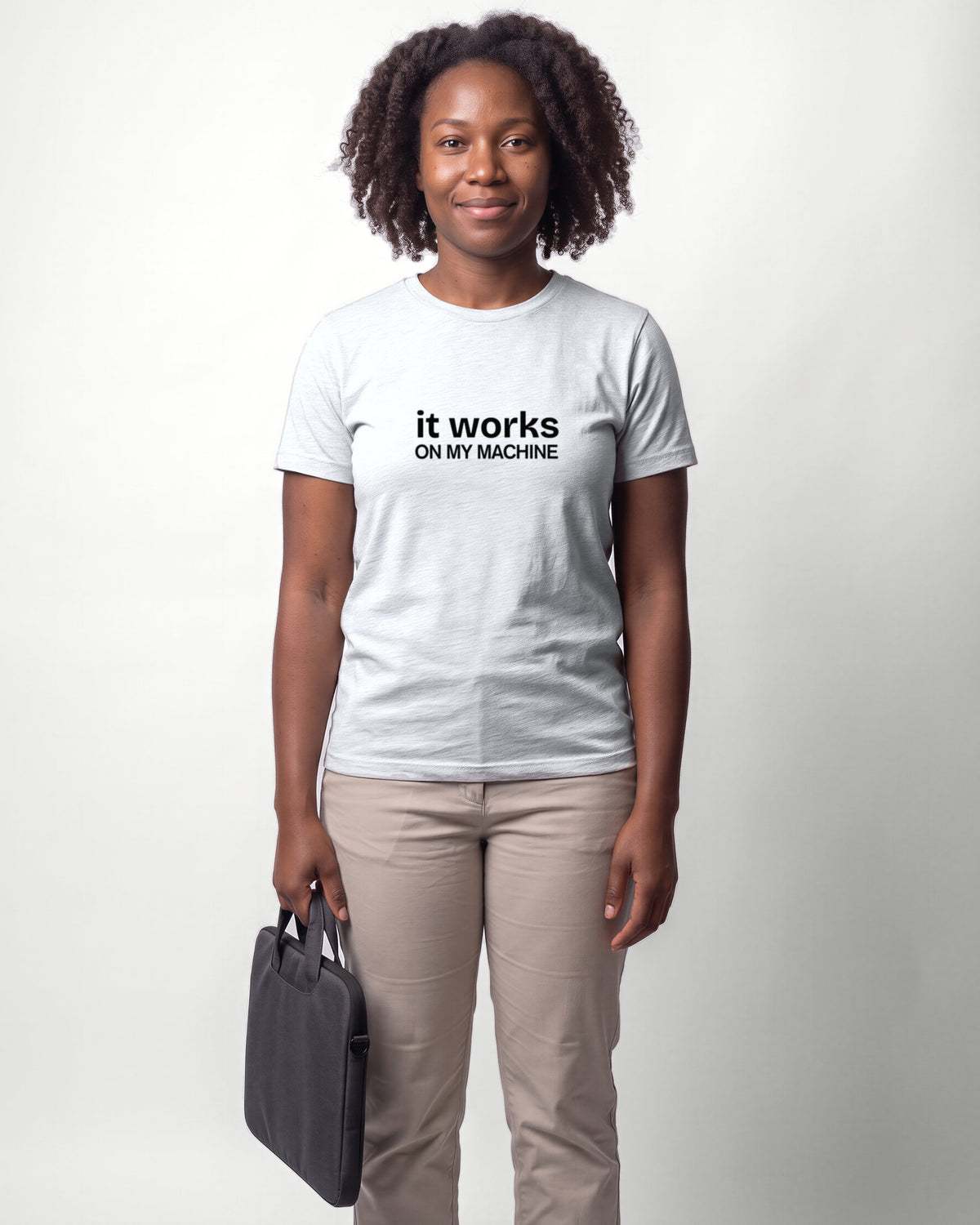It works on my machine in Ash on Bella+Canvas 3001, worn by Nia. AI-generated model.