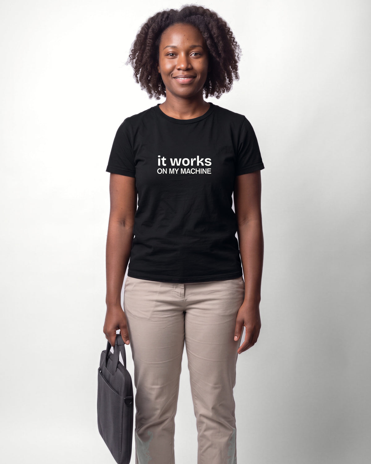 It works on my machine in Black on Bella+Canvas 3001, worn by Nia. AI-generated model.