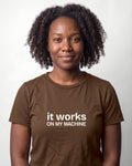 It works on my machine in Brown on Bella+Canvas 3001, worn by Nia. AI-generated model.