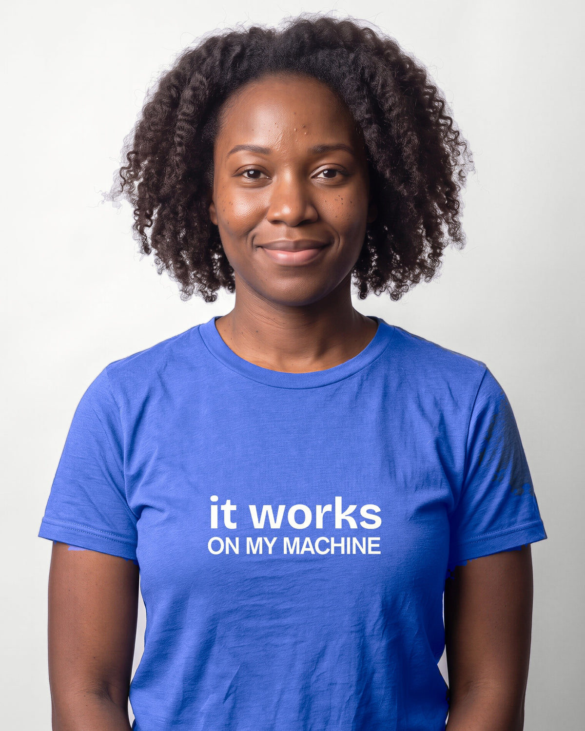 It works on my machine in Heather True Royal on Bella+Canvas 3001, worn by Nia. AI-generated model.