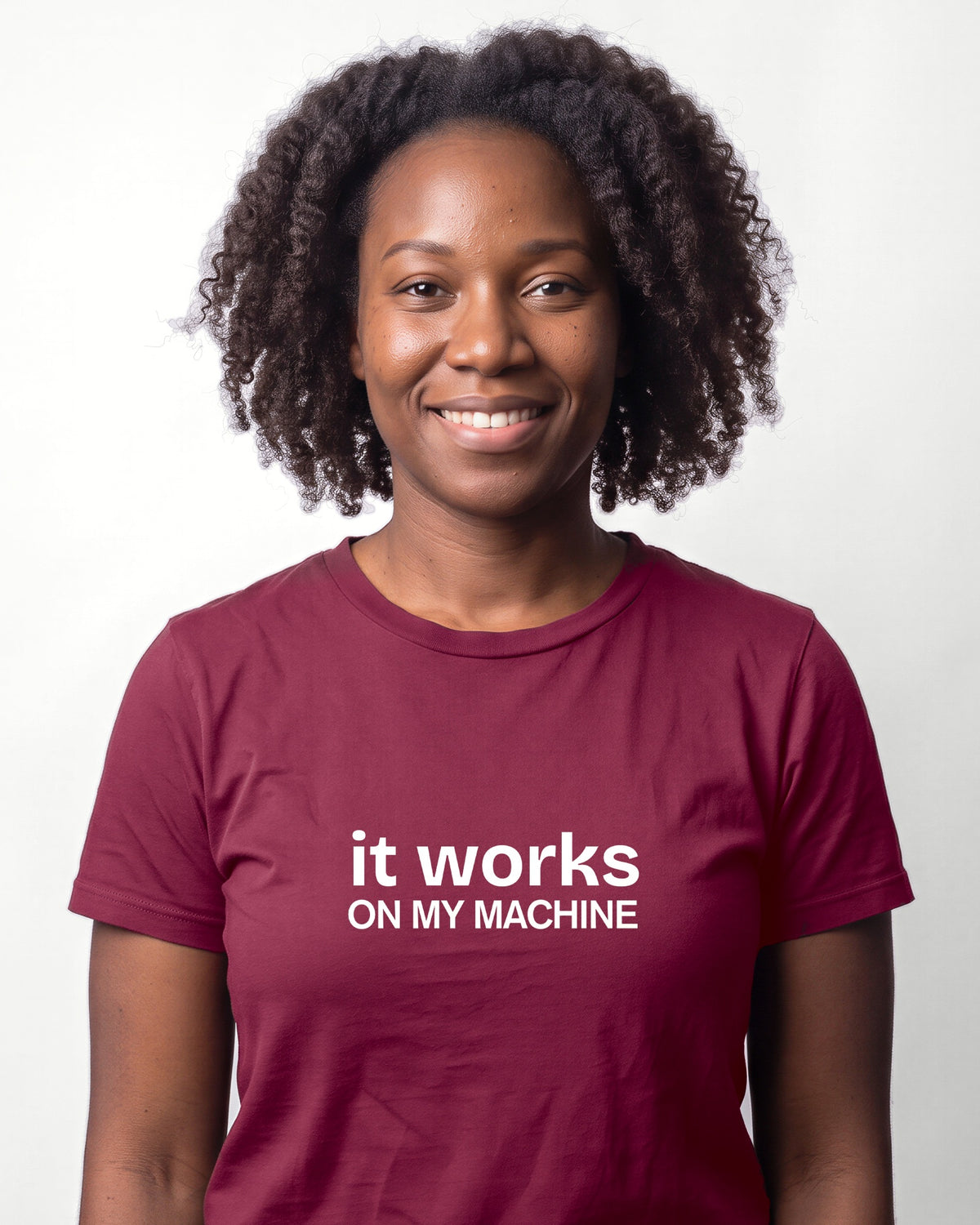 It works on my machine in Maroon on Bella+Canvas 3001, worn by Nia. AI-generated model.