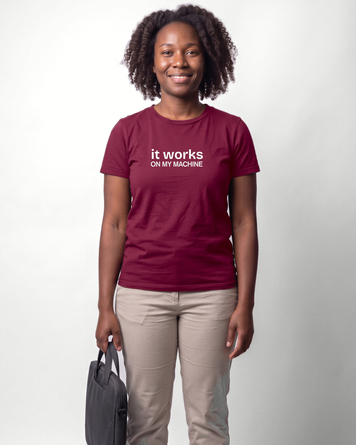 It works on my machine in Maroon on Bella+Canvas 3001, worn by Nia. AI-generated model.