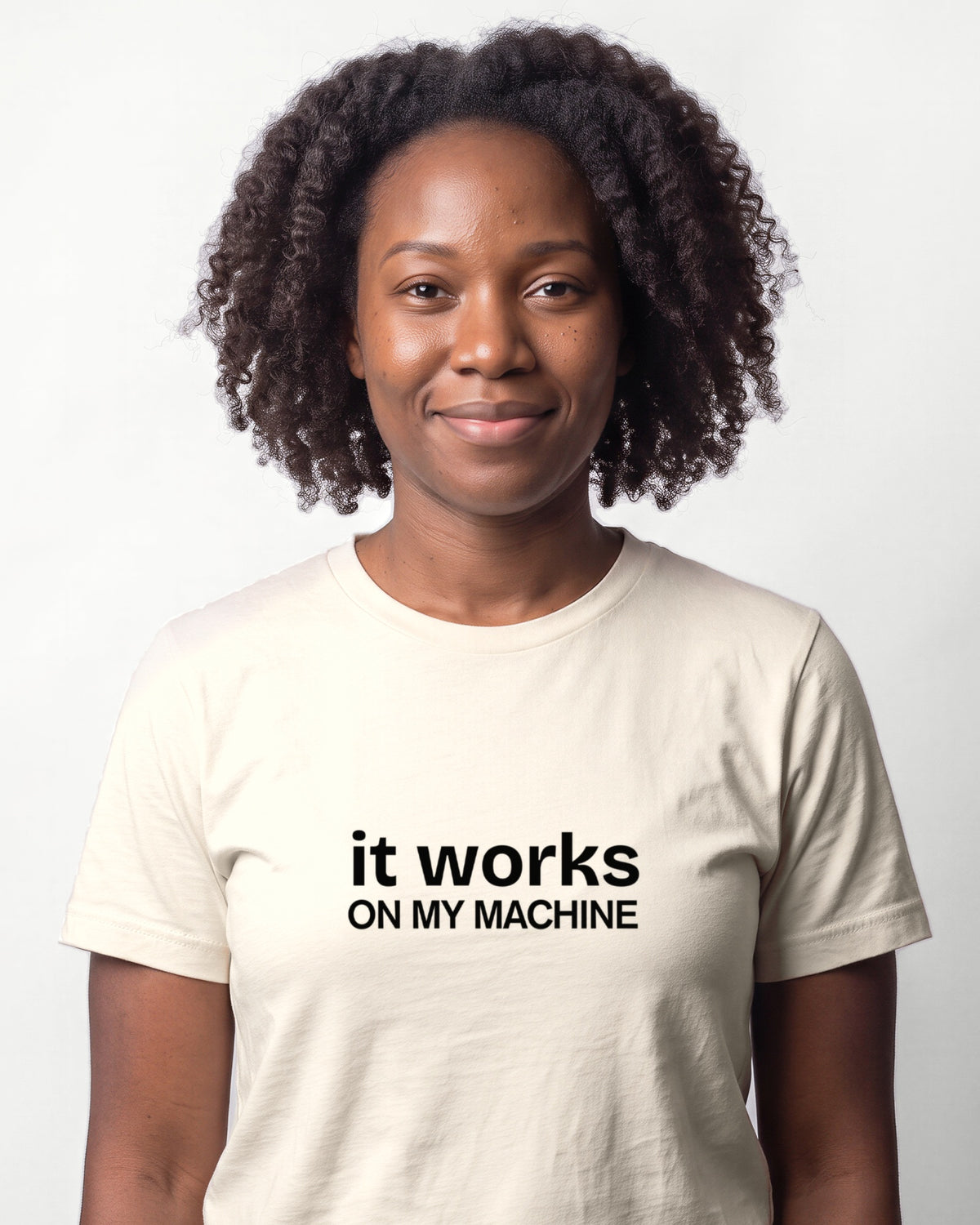 It works on my machine in Natural on Bella+Canvas 3001, worn by Nia. AI-generated model.