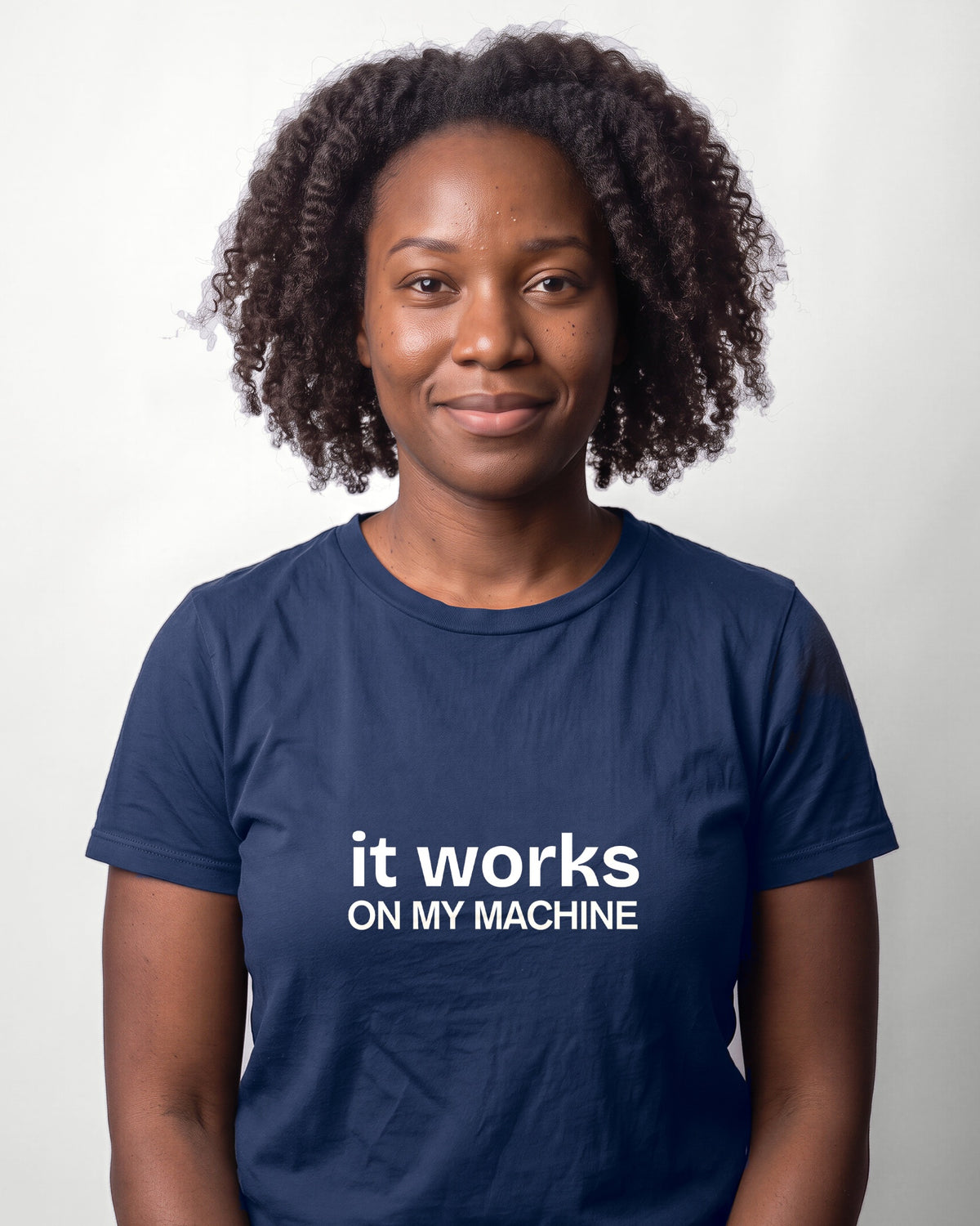 It works on my machine in Navy on Bella+Canvas 3001, worn by Nia. AI-generated model.